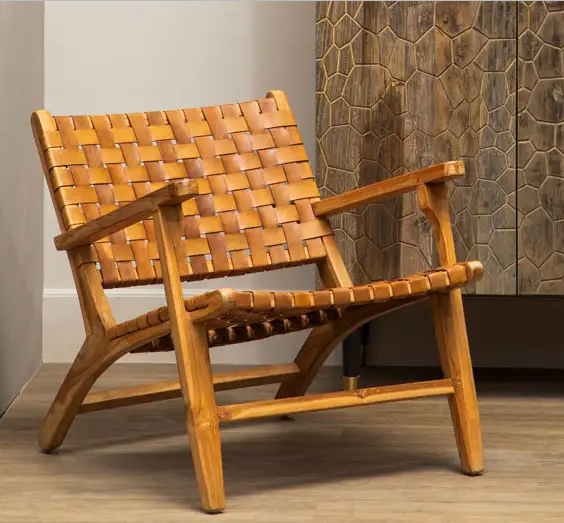 Woven, brown leather chair with a wooden frame